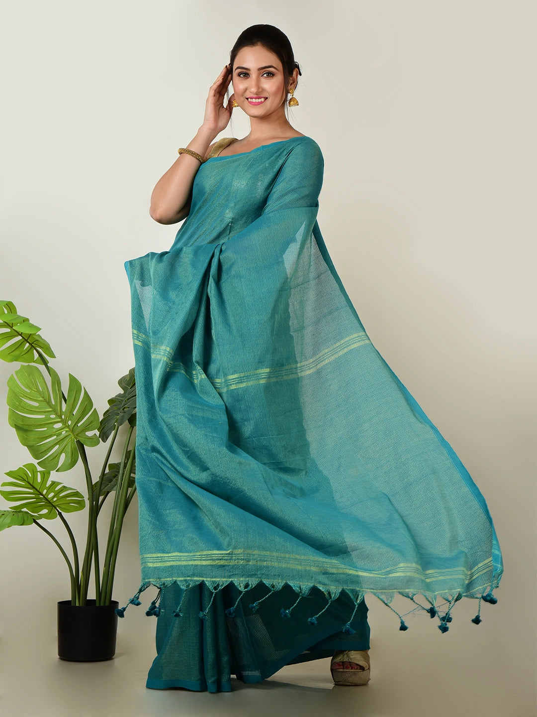 Mystic Lagoon | Turquoise Green Handloom Linen Saree with Golden Zari Stripe