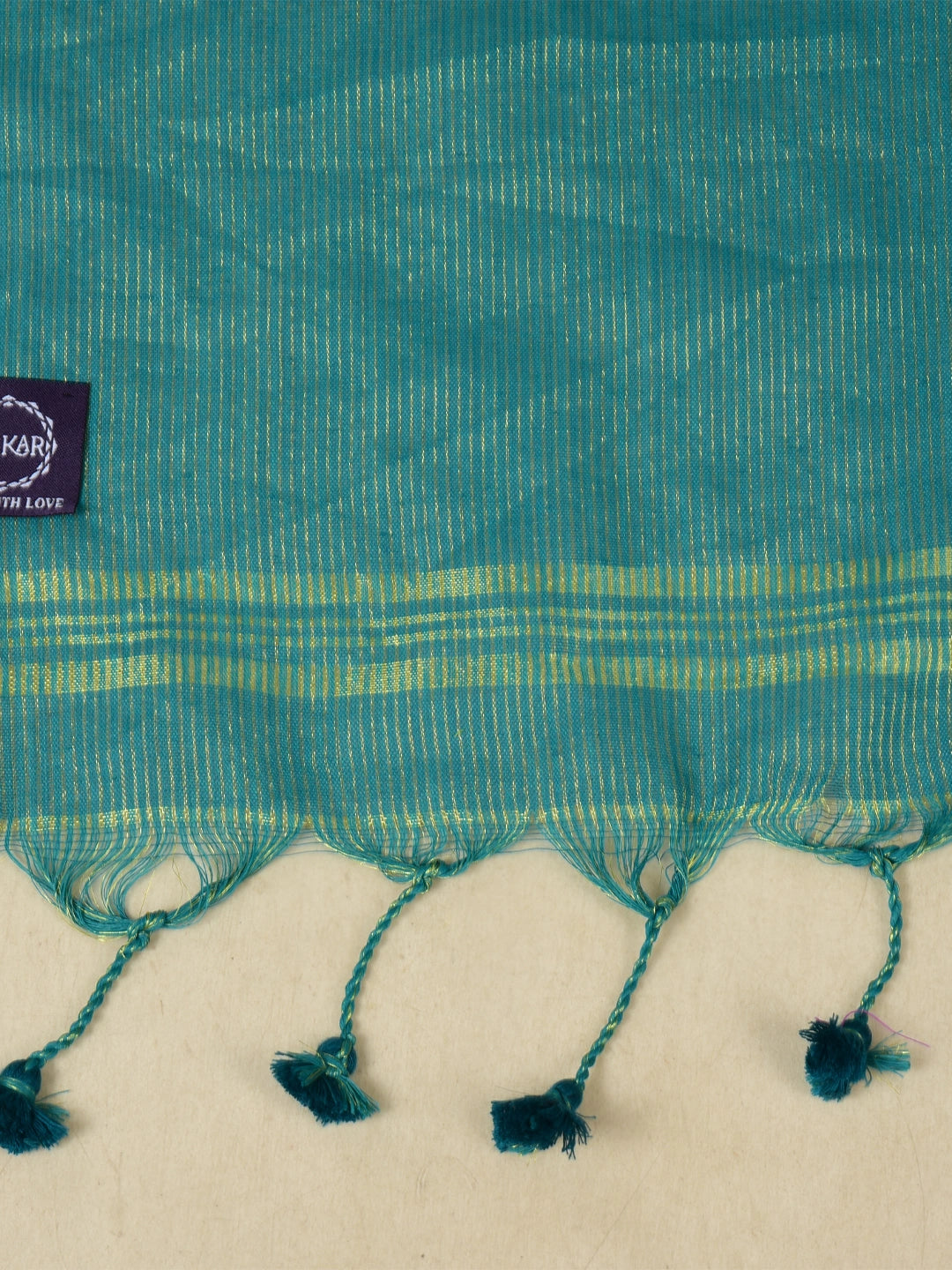 Mystic Lagoon | Turquoise Green Handloom Linen Saree with Golden Zari Stripe