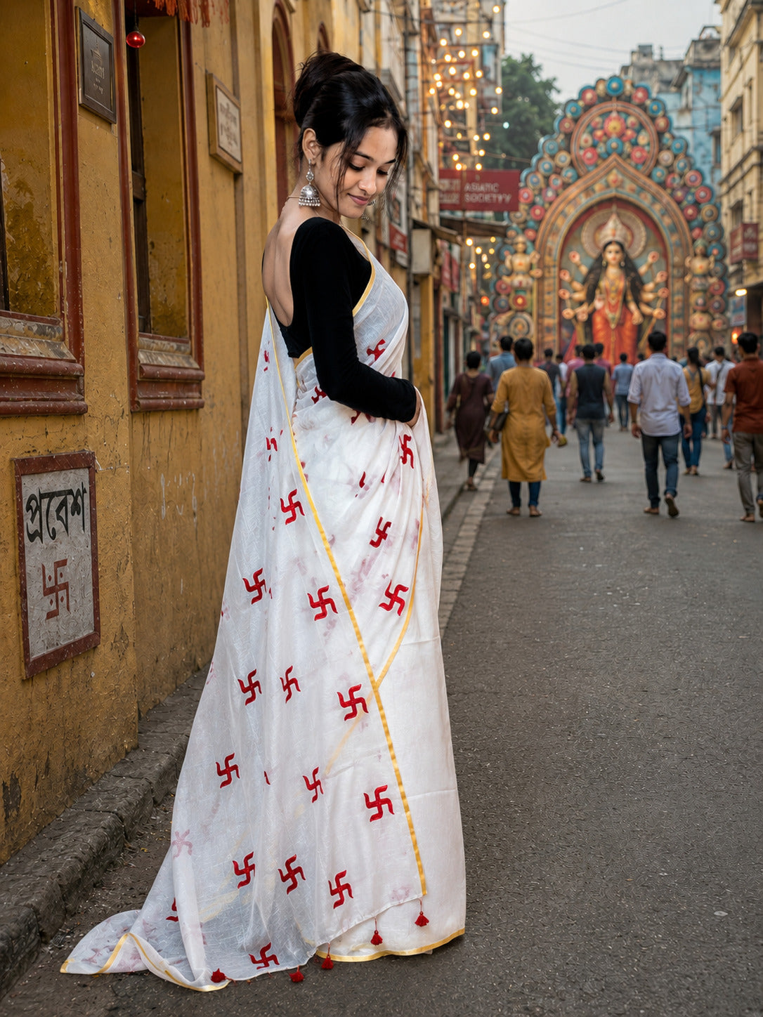 White Handloom Saree with Red Swastik Motifs & Yellow Border