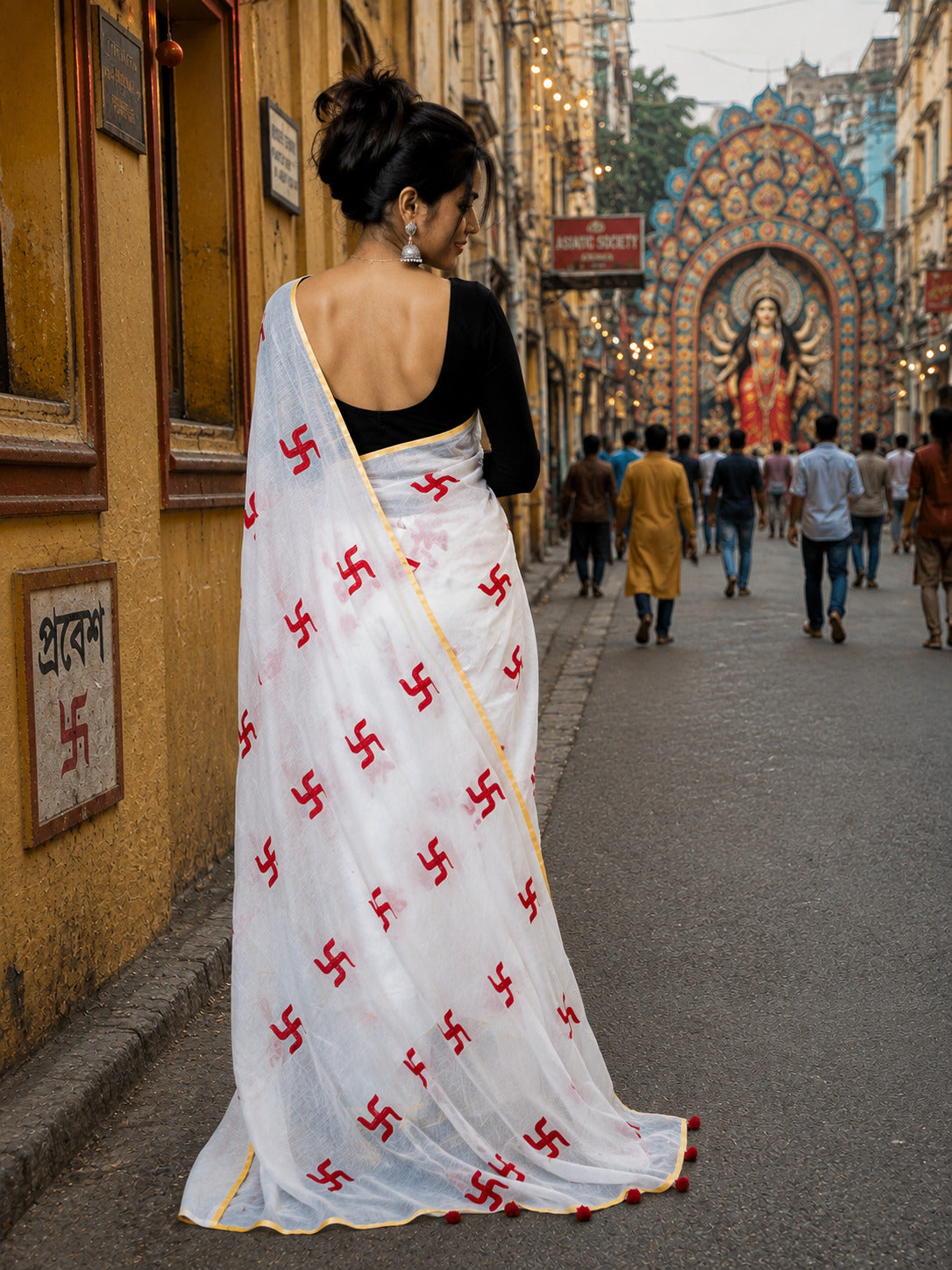 White Handloom Saree with Red Swastik Motifs & Yellow Border